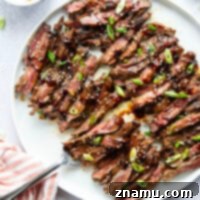 Marinated in a spicy gochujang sauce and grilled to smoky perfection, this grilled gochujang skirt steak can be prepped ahead of time and is always a popular meat for cookouts!