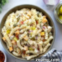 Zesty Bacon Dill Pasta Salad 8 Pickle-lovers won't be able to resist this loaded dill pickle pasta salad! Tender pasta is tossed in a creamy dill pickle juice dressing with lots of smoky bacon, cheddar, and extra dill pickles.