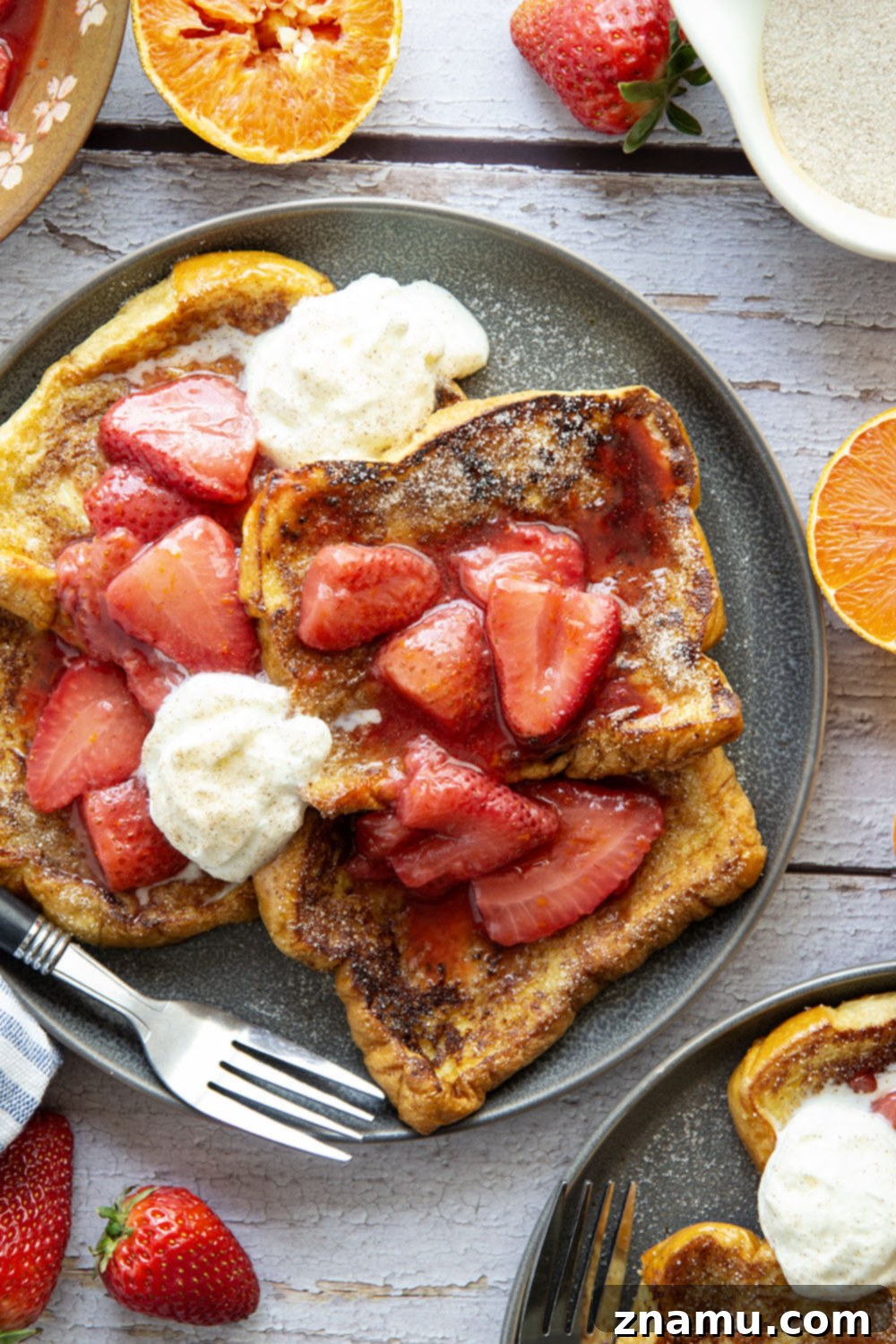 Golden Cinnamon Sugar French Toast with Zesty Strawberry Orange Sauce 3 Close-up of Cinnamon Sugar French Toast with luscious strawberry orange sauce, showcasing its irresistible appeal.