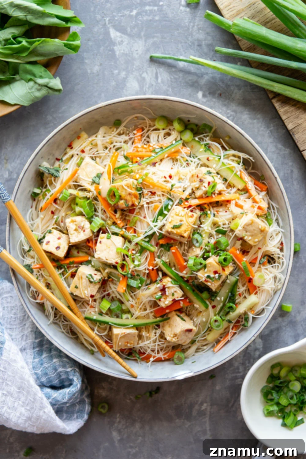 A beautifully arranged Vermicelli Noodle Salad with sweet chili tofu, fresh vegetables, and herbs, perfect for a healthy and flavorful meal.