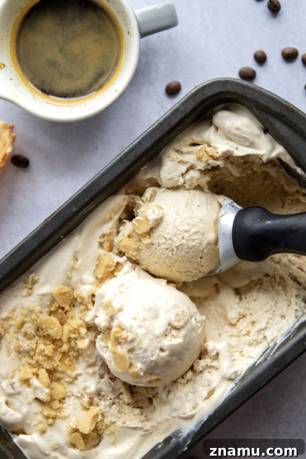 Toffee Espresso Chill 5 Ingredients for no-churn espresso ice cream laid out on a table: heavy cream, condensed milk, espresso, vanilla, and homemade toffee.