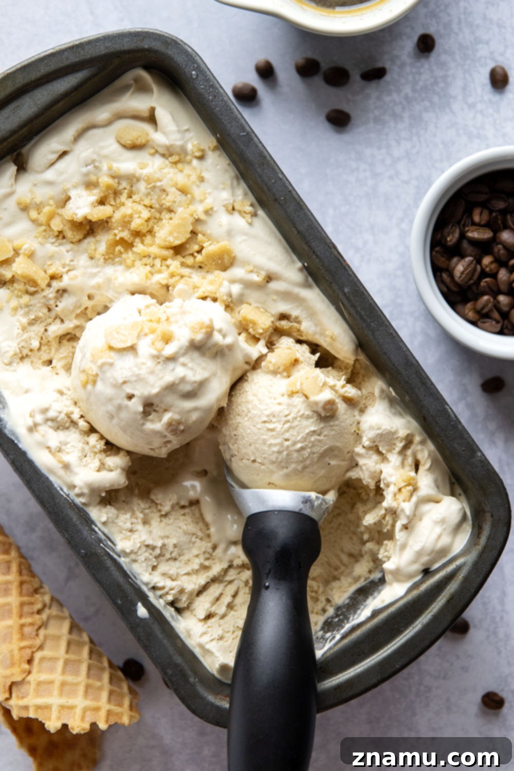 Toffee Espresso Chill 6 Close-up of creamy espresso ice cream with toffee bits in a bowl, ready to be served.