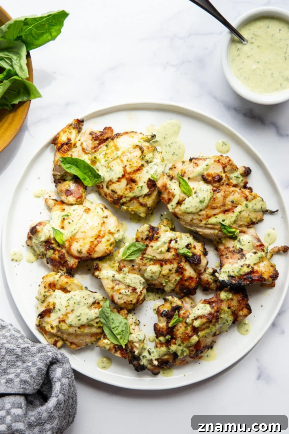 Green Goddess Fire-Kissed Chicken 5 This green goddess grilled chicken features juicy chicken thighs marinated in an herby homemade green goddess dressing and grilled until perfectly smoky and tender.