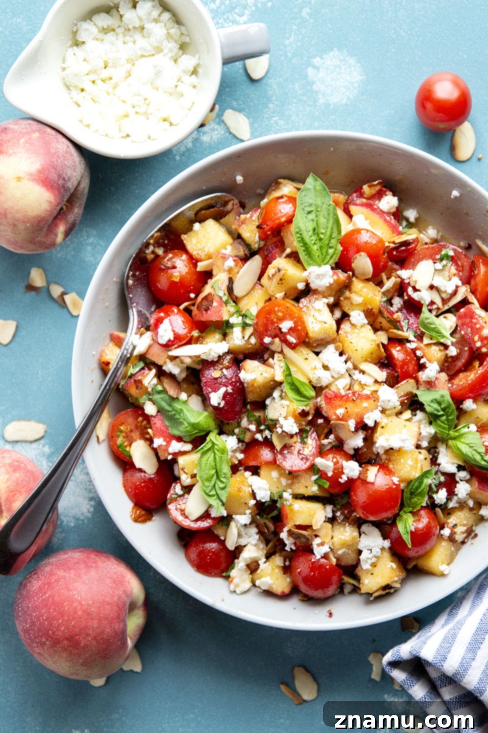 Peach Feta Heatwave Salad 5 This peach feta salad features juicy peaches, tangy feta, and an incredible sweet and spicy hot honey sauce coating every bite!