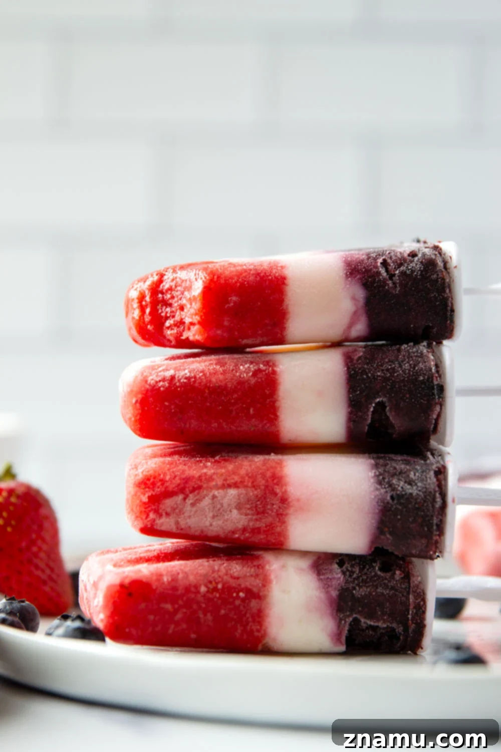 Stars and Stripes Pops 2 Easy layered red, white, and blue popsicles for 4th of July