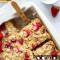 Strawberry Crumble Baked Oats 8 Baked with juicy strawberries and a buttery streusel on top, this strawberry baked oatmeal is soft, fluffy, and incredible with creamy Greek yogurt.