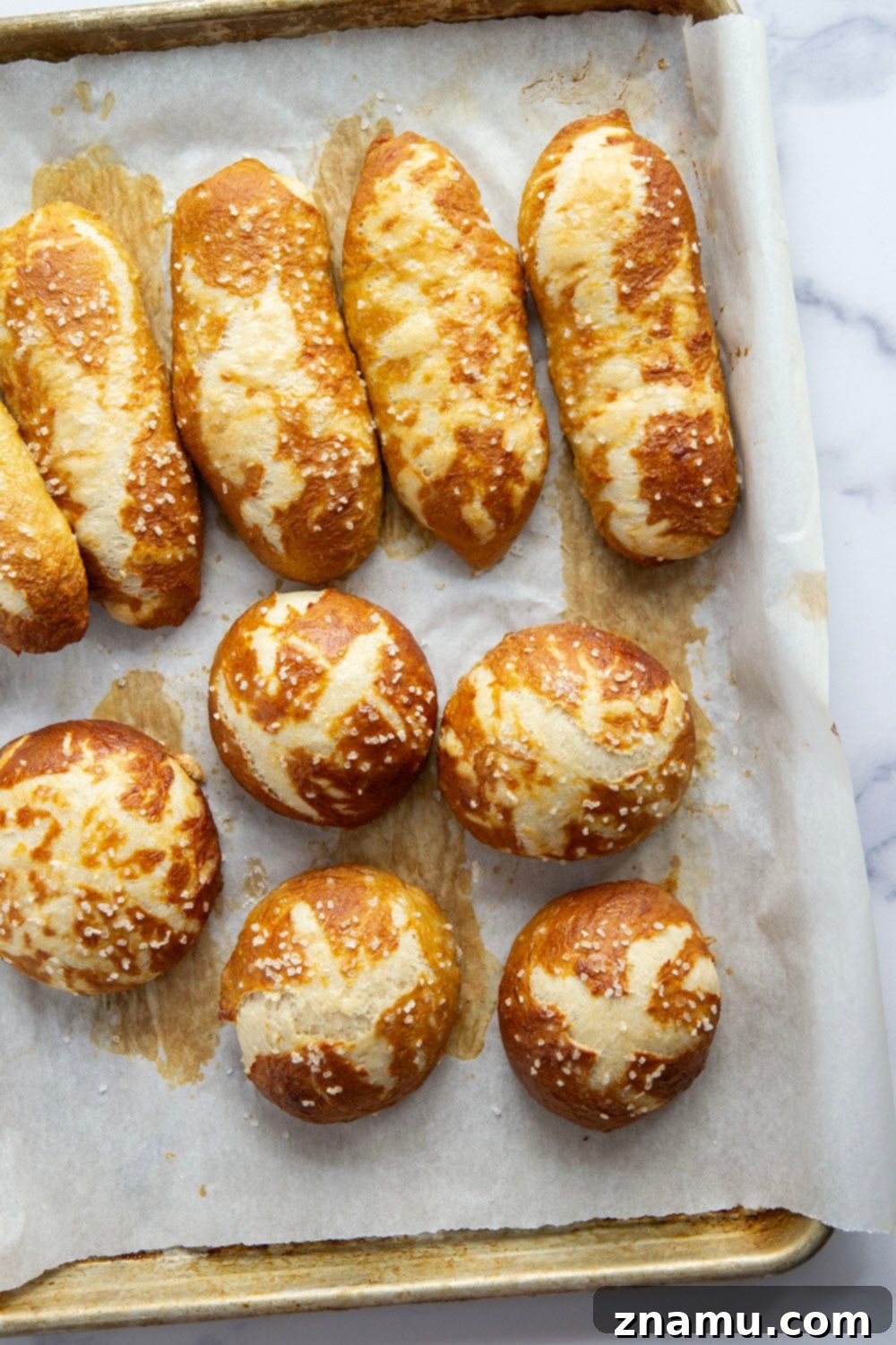 Effortless No-Knead Pretzel Buns 3 These no-knead pretzel buns are perfectly soft and sturdy inside with a golden, crispy exterior. Use them as a base for hamburgers, hot dogs, brats, and pretty much any sandwich you can think of!