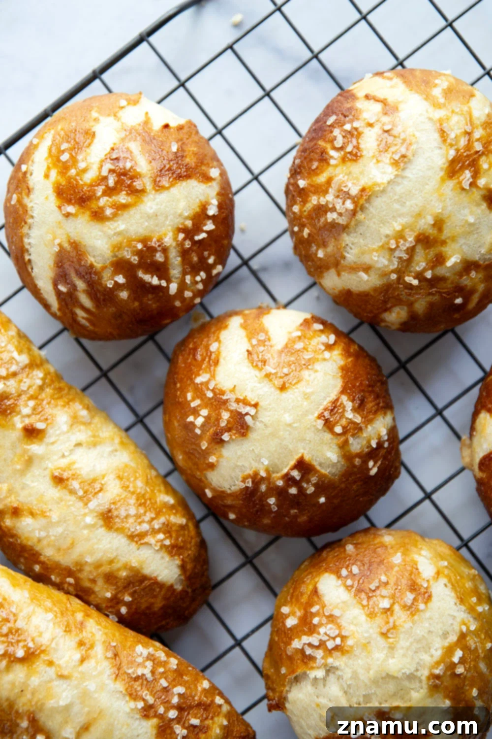 Effortless No-Knead Pretzel Buns 4 These no-knead pretzel buns are perfectly soft and sturdy inside with a golden, crispy exterior. Use them as a base for hamburgers, hot dogs, brats, and pretty much any sandwich you can think of!
