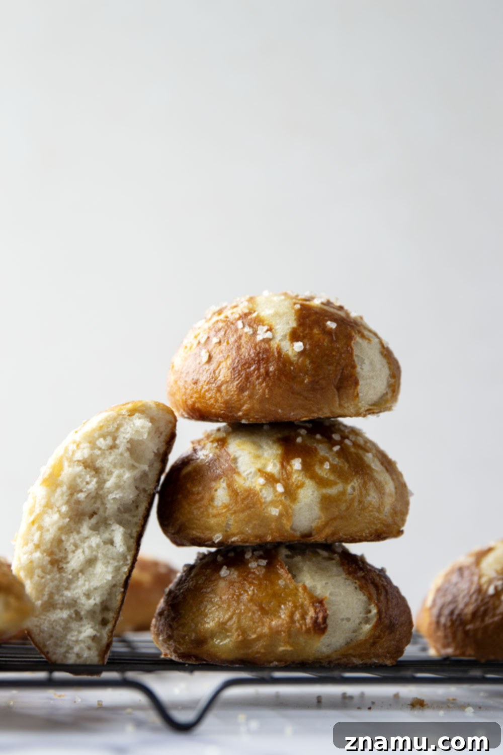 Effortless No-Knead Pretzel Buns 5 These no-knead pretzel buns are perfectly soft and sturdy inside with a golden, crispy exterior. Use them as a base for hamburgers, hot dogs, brats, and pretty much any sandwich you can think of!