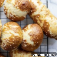Effortless No-Knead Pretzel Buns 8 These no-knead pretzel buns are perfectly soft and sturdy inside with a golden, crispy exterior. Use them as a base for hamburgers, hot dogs, brats, and pretty much any sandwich you can think of!