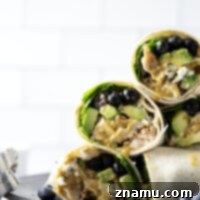 Stuffed with juicy honey mustard grilled chicken, sweet blueberries, silky avocado, and lots of greens, this honey mustard chicken wrap is easy to prep ahead of time for a stellar lunch!