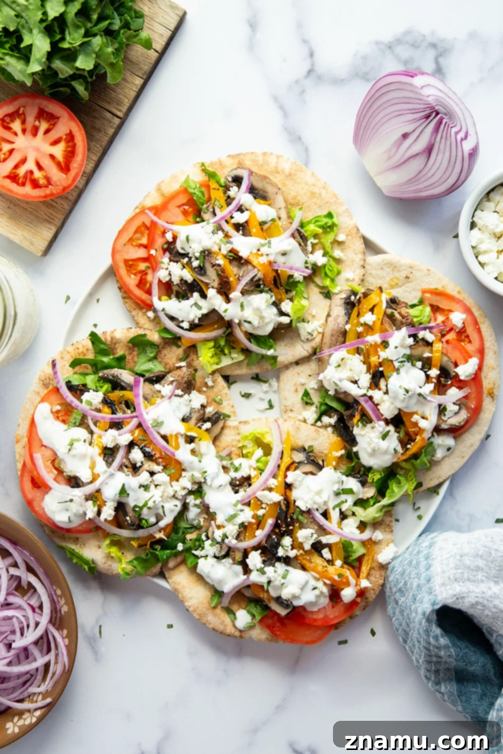 Savory Grilled Portobello Gyros 4 These portobello mushroom gyros feature tender portobello mushrooms and sweet peppers marinated in a flavorful yogurt marinade, grilled to perfection, and stuffed in a soft pita with all the classic gyro ingredients.