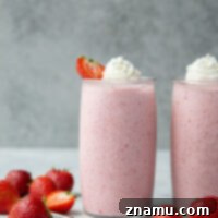 Packed with sweet strawberries and perfectly creamy, this strawberries and cream smoothie is fast to whip up and and only 5 ingredients!