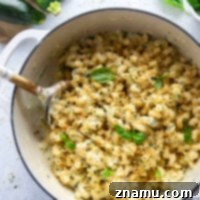 Creamy One-Pot Zucchini Mac and Cheese 8 Made entirely in one pot, this zucchini mac and cheese is rich, creamy, and packed with tons of shredded zucchini that no one will even notice!