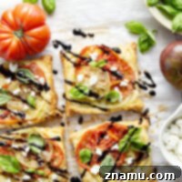 Jewel-Toned Heirloom Tomato Tarts with Tangy Goat Cheese 8 Flaky puff pastry is baked with a sweet heirloom tomato filling and lots of flavorful goat cheese in these easy heirloom tomato tarts!