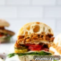 Romesco Chicken Crunch Sandwich 8 Crispy pan-fried chicken cutlets and a flavorful homemade romesco sauce are the most incredible sandwich pairing in this crispy chicken romesco sandwich!