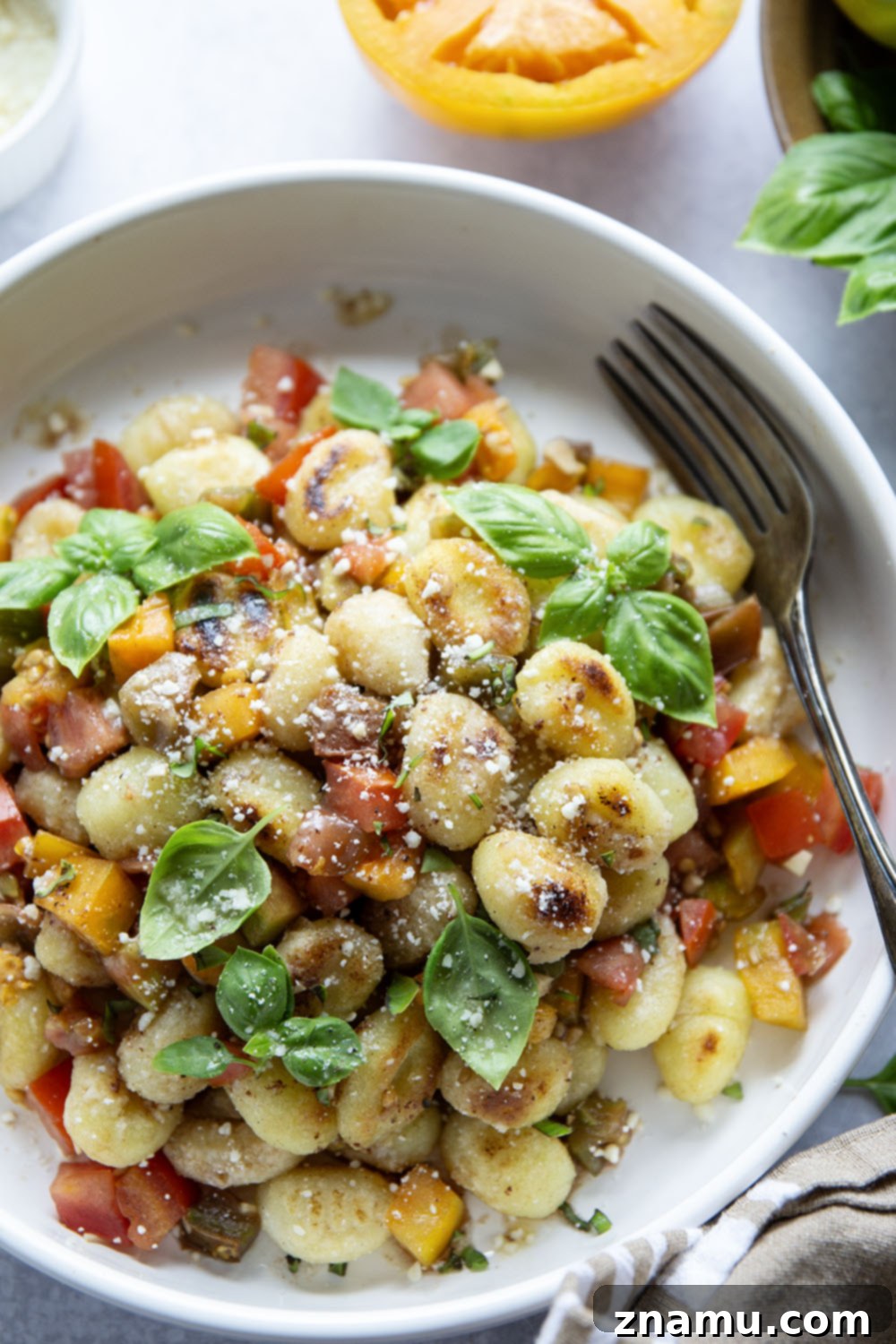 Golden-Crisp Bruschetta Gnocchi with Nutty Brown Butter 6 This bruschetta gnocchi features crispy pan-fried gnocchi topped with a fresh tomato bruschetta topping and a few drizzles of nutty browned butter.