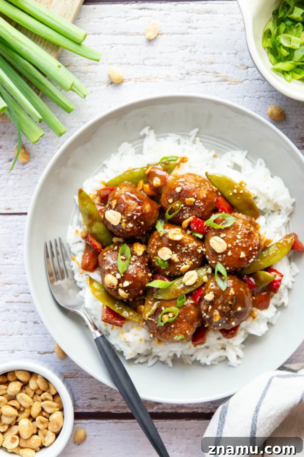 Nutty Satay Chicken Bites 4 Prepared Peanut Satay Chicken Meatballs ready to be combined with sauce and vegetables