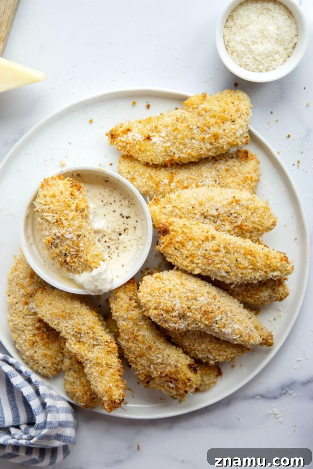 Crispy oven-baked black pepper asiago chicken tenders with aioli