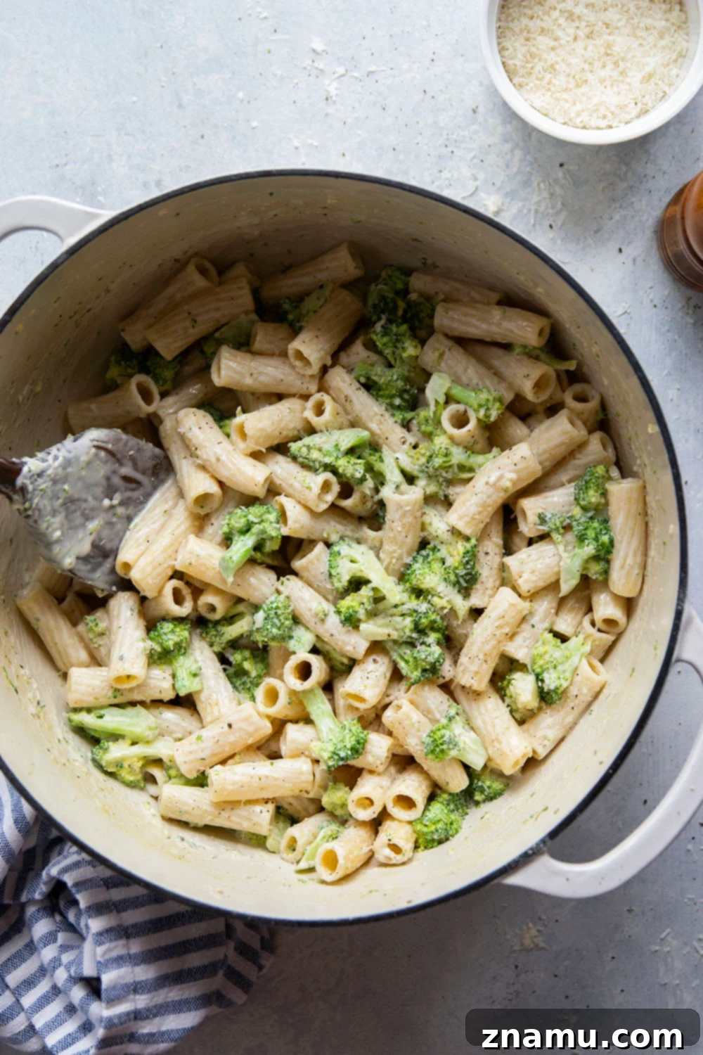 Velvety Parmesan Broccoli Pasta 3 Close-up shot of creamy Parmesan broccoli pasta in a large pot
