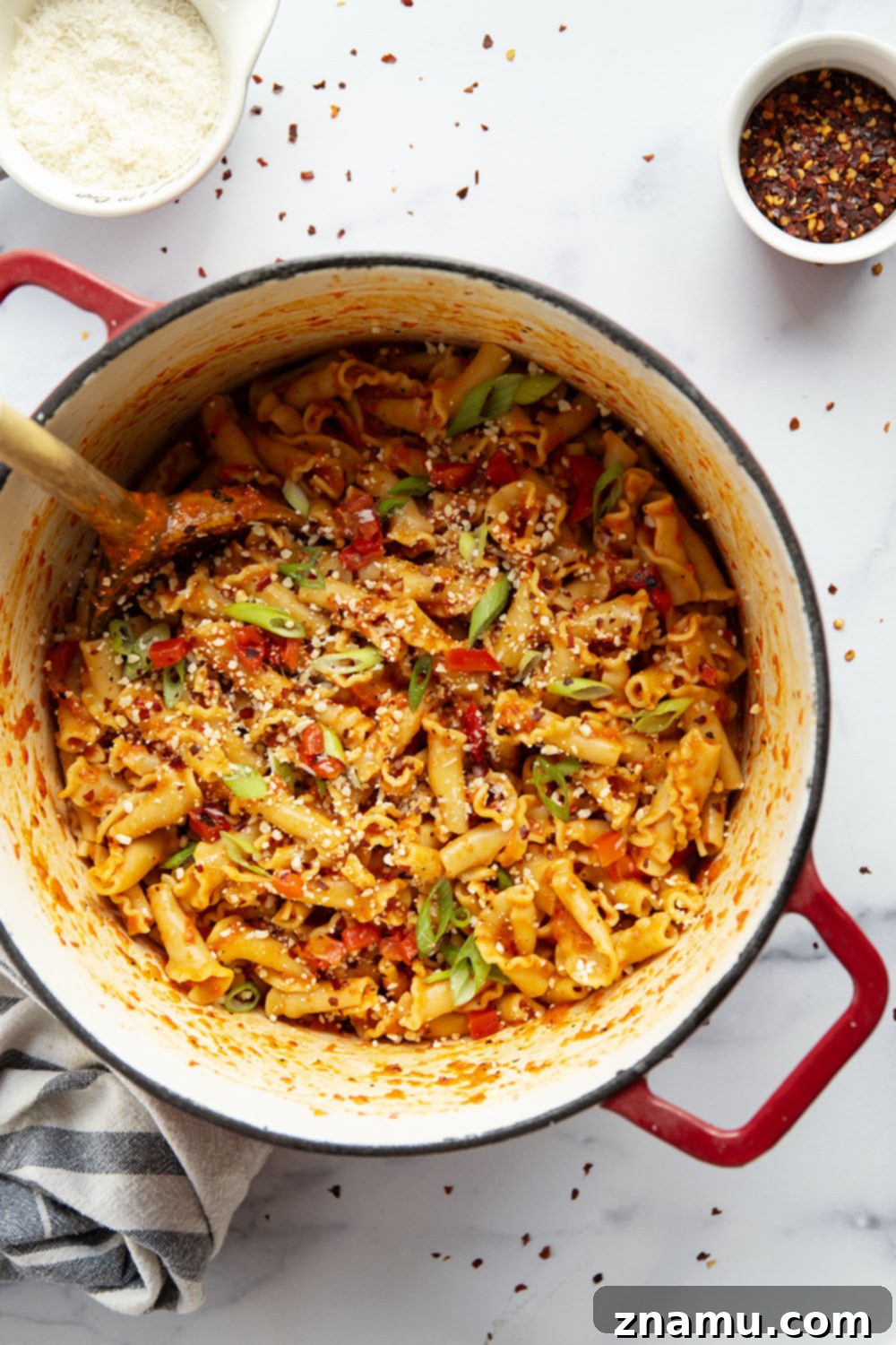 Fiery Roasted Red Pepper Pasta 3 Close-up of roasted red pepper pasta with creamy sauce.