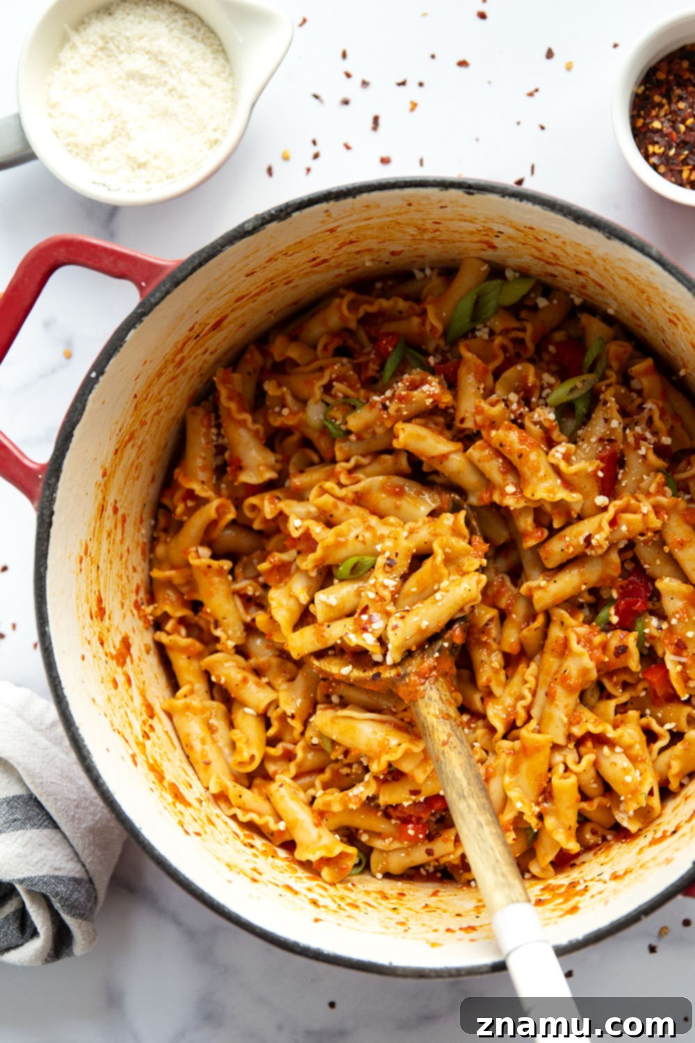 Fiery Roasted Red Pepper Pasta 5 Ingredients for creamy roasted red pepper pasta laid out.