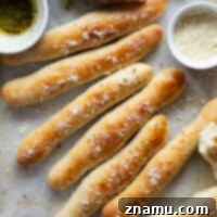 Irresistible Homemade Breadsticks 8 Perfect homemade breadsticks with garlic herb butter and Parmesan cheese.