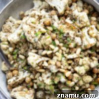 Za'atar Roasted Cauliflower & Chickpea Delight 8 Za'atar Roasted Cauliflower and Chickpeas, a delicious vegan sheet pan meal.