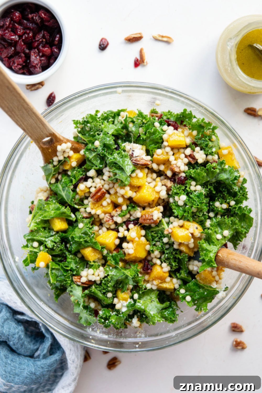 Vibrant Roasted Butternut Squash Couscous Salad 4 This butternut squash couscous salad features spice-roasted butternut squash, tender pearl couscous, and lots of fall ingredients all tossed in a honey Dijon dressing.