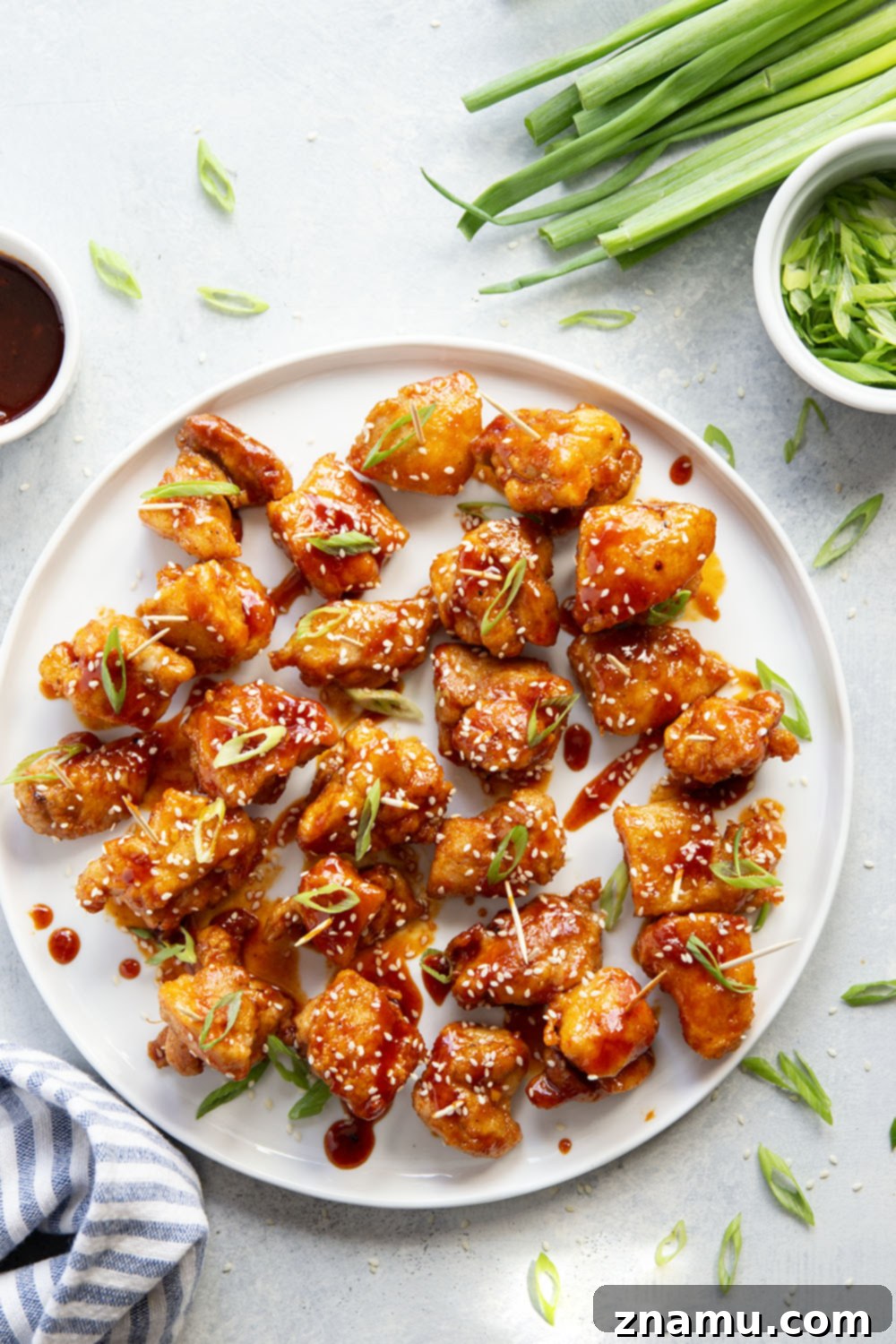 Gochujang Glazed Chicken Bites 4 Ingredients for sticky gochujang chicken bites laid out, including chicken, gochujang, honey, soy sauce, and seasonings.