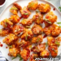 Gochujang Glazed Chicken Bites 8 Pan fried until perfectly crispy and tossed in a spicy gochujang sauce, these sticky gochujang chicken bites are an easy flavor-packed appetizer!