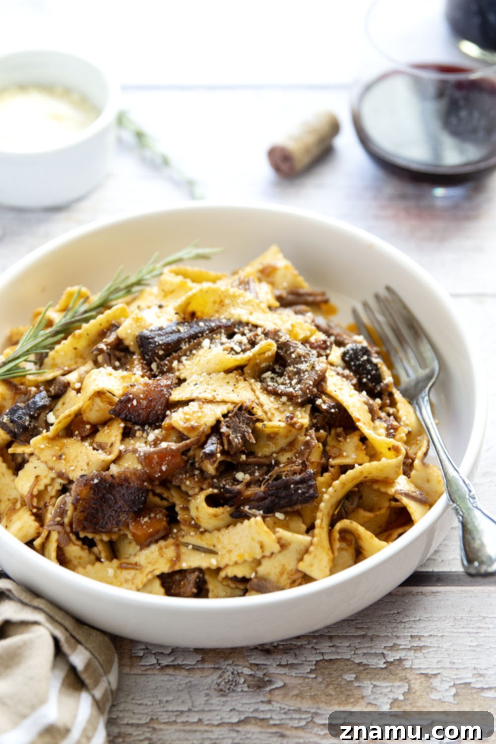 Braised for hours in flavorful red wine and lots of aromatics, this red wine beef short rib ragu features tender pappardelle noodles folded into a fall-apart tender short rib red wine sauce.