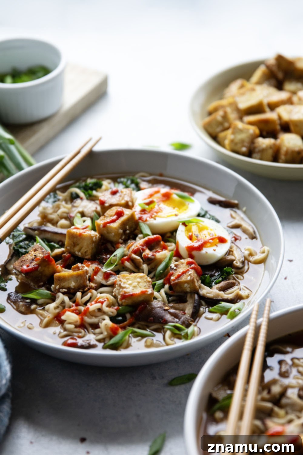 Loaded with tender shiitake mushrooms and crispy sesame tofu in a savory veggie broth, this shiitake mushroom ramen is packed to capacity with flavor!