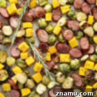 Rustic Sausage and Butternut Sheet Pan Dinner 8 This sausage and butternut squash is tossed in a flavorful rosemary honey mustard sauce and roasted entirely on only one sheet pan in minutes.