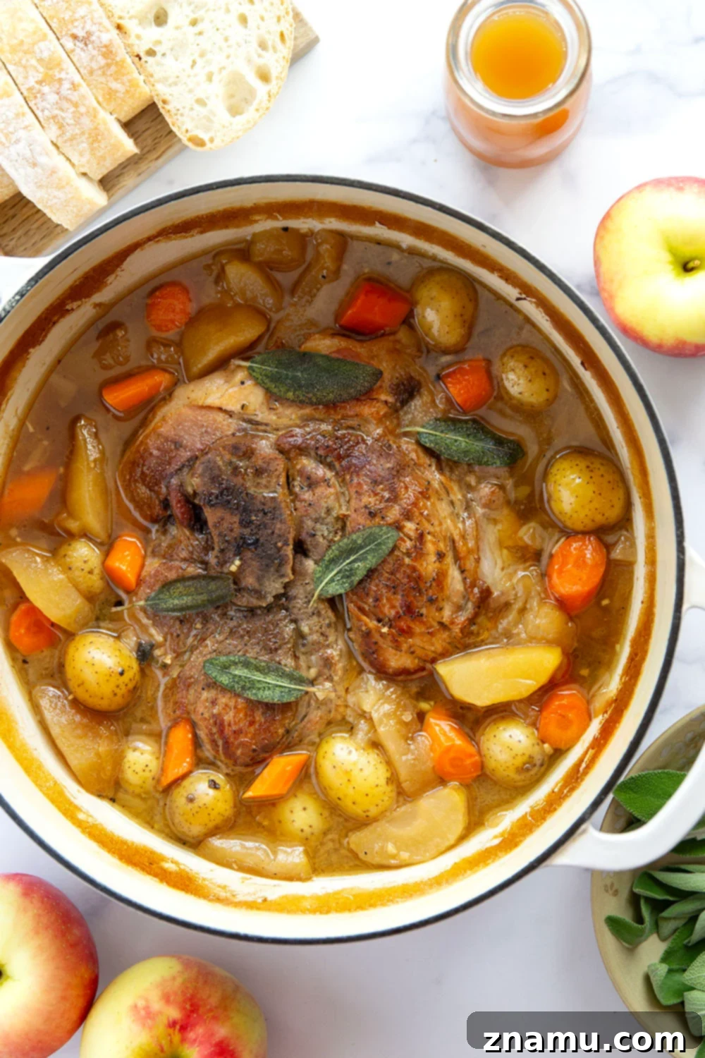 Slow-Braised Pork Shoulder with Apple Cider and Sage 3 Braised low and slow in sweet apple cider and fragrant fresh sage, this apple cider braised pork shoulder cooks up fall-apart tender and is a fall dinner favorite!