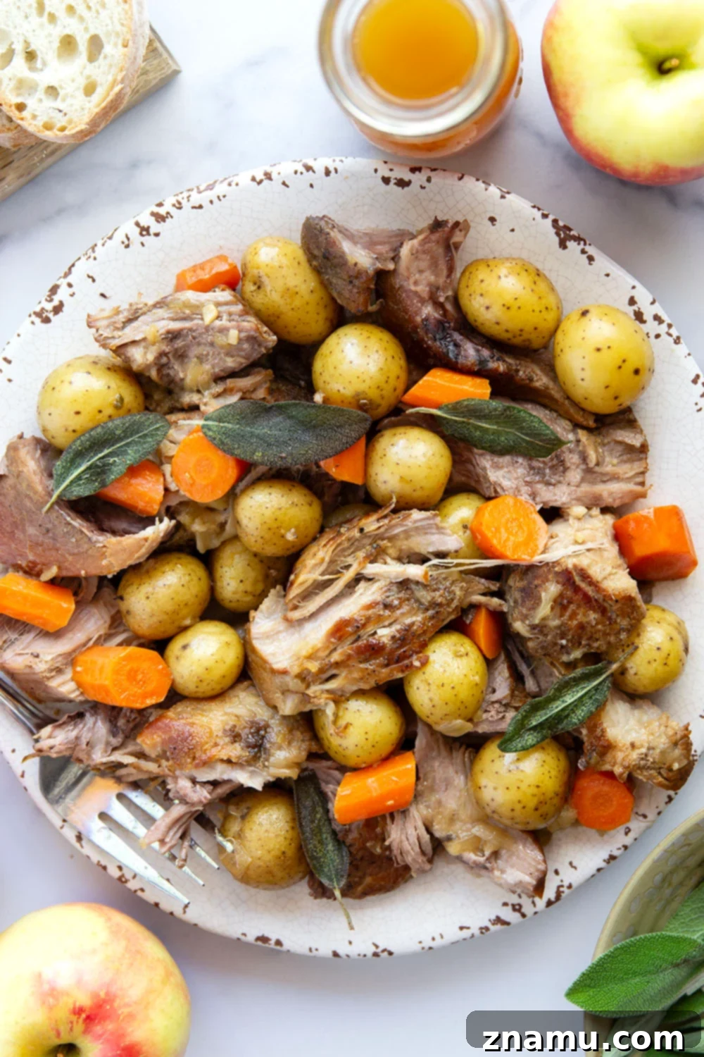 Slow-Braised Pork Shoulder with Apple Cider and Sage 4 Braised low and slow in sweet apple cider and fragrant fresh sage, this apple cider braised pork shoulder cooks up fall-apart tender and is a fall dinner favorite!