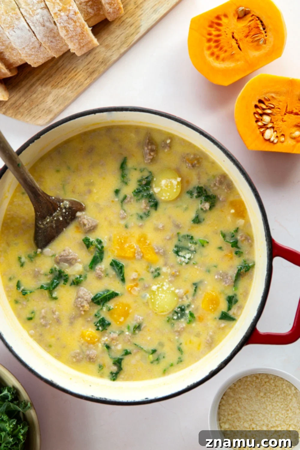 Soft butternut squash cubes change up classic zuppa toscana into a fall comfort food favorite! This butternut squash zuppa toscana comes together in minutes and is amazing with rustic bread for dipping.