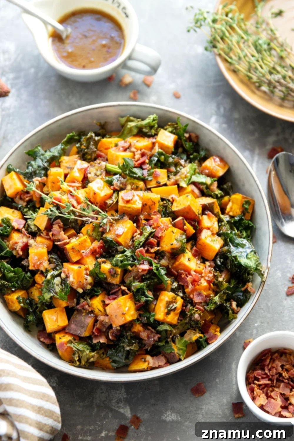 Hearty Sweet Potato Medley with Savory Bacon Infusion 5 Ingredients for warm sweet potato salad laid out on a board