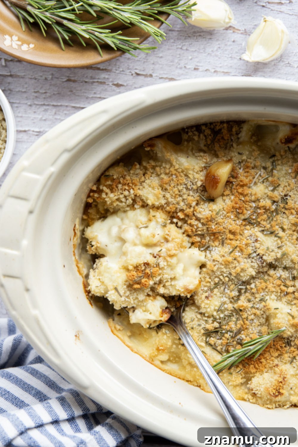 Garlicky Cheesy Cauliflower Gratin 4 Close-up of the roasted garlic prior to being mashed into the creamy sauce.