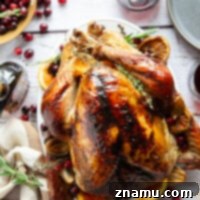 Brushed with a rich maple syrup glaze and roasted to perfection, this maple glazed turkey is the perfect centerpiece for any Thanksgiving dinner! No brining or extra prep work required.