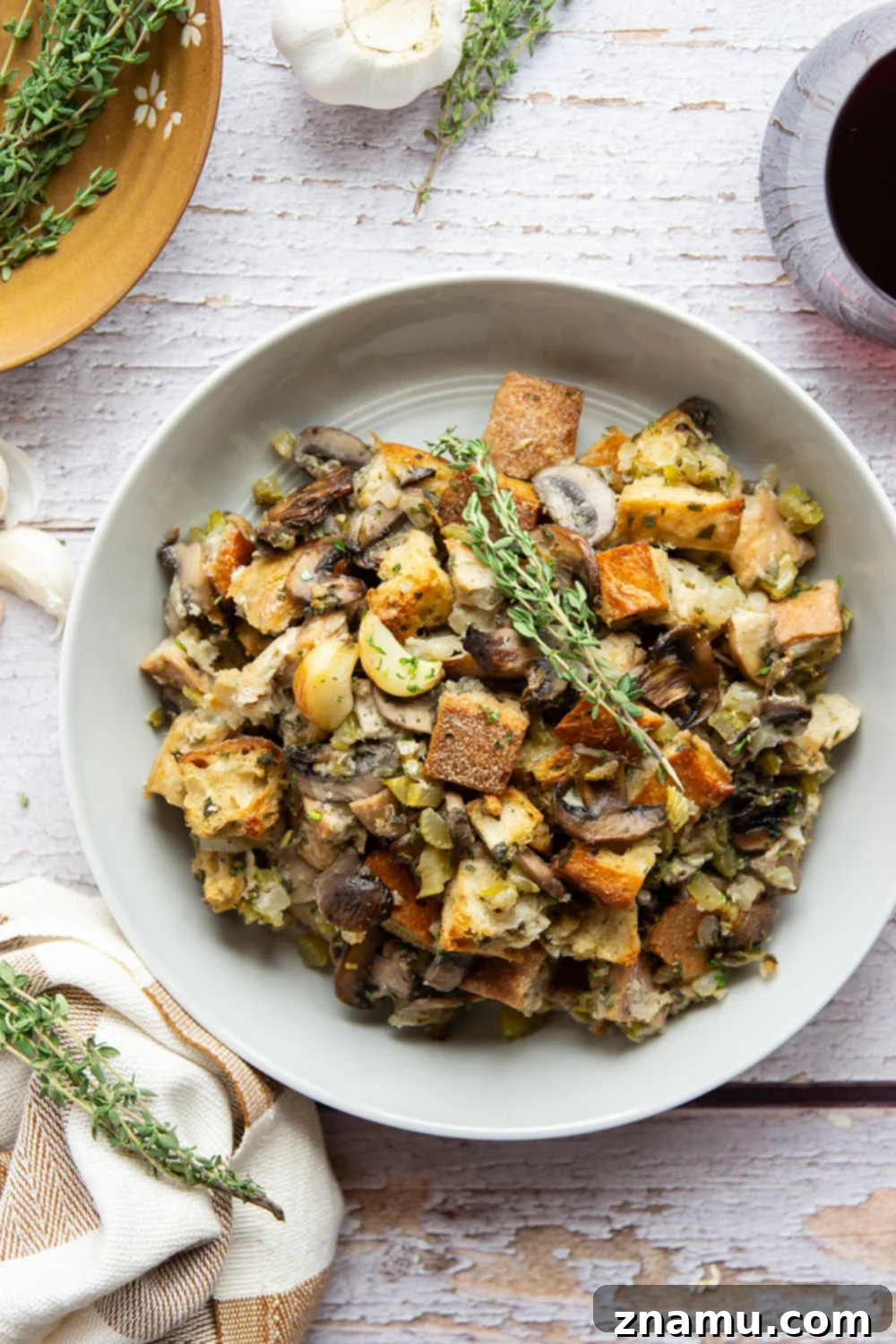 Savory Roasted Garlic Mushroom Stuffing 3 An irresistible side dish featuring sweet roasted garlic and umami-rich mushrooms, this stuffing is a holiday table essential.