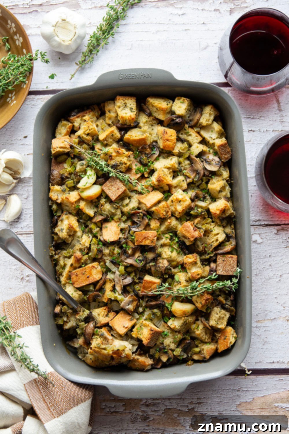 Savory Roasted Garlic Mushroom Stuffing 6 A delicious scoop of Roasted Garlic Mushroom Stuffing on a plate, ready to be served.