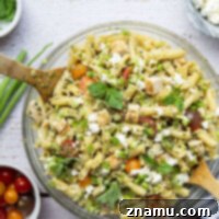Juicy grilled chicken and a flavorful pesto vinaigrette takes this chicken pesto pasta salad to the next level! Perfect for cookouts or a lunch salad.