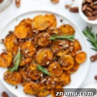 Crispy Maple Smashed Sweet Potatoes with rosemary and pecans.