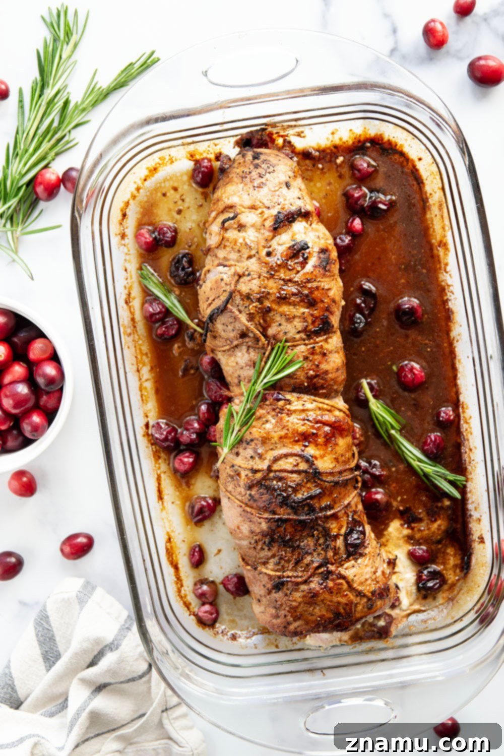 Close-up of the delicious Goat Cheese Cranberry Stuffed Pork Loin, showing its golden crust and flavorful filling