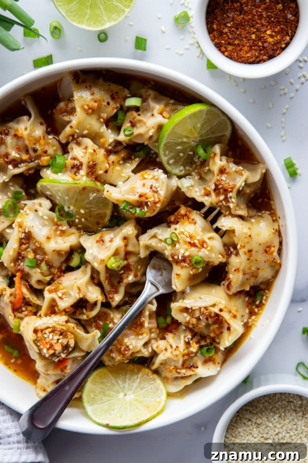 Delicious spicy chicken wontons in a bowl, ready to be served