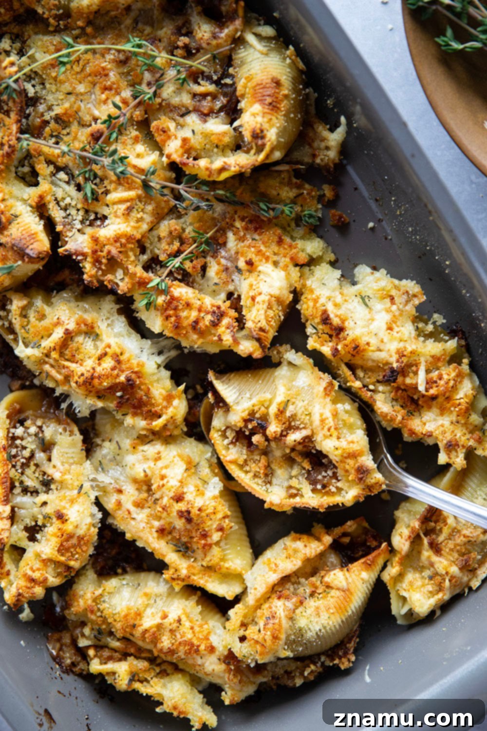 Caramelized Onion Gruyère Stuffed Shells 6 A baked pan of French Onion Stuffed Shells, ready to be served.