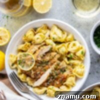 Lemon Caper Chicken Tortellini 8 This chicken piccata tortellini features juicy seared chicken cutlets served over tender cheese-filled tortellini with a flavorful white wine lemon sauce drizzled on top.
