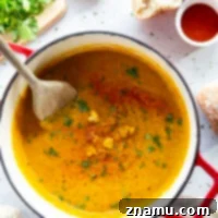 Moroccan Cauliflower Soup garnished with fresh cilantro and a touch of paprika