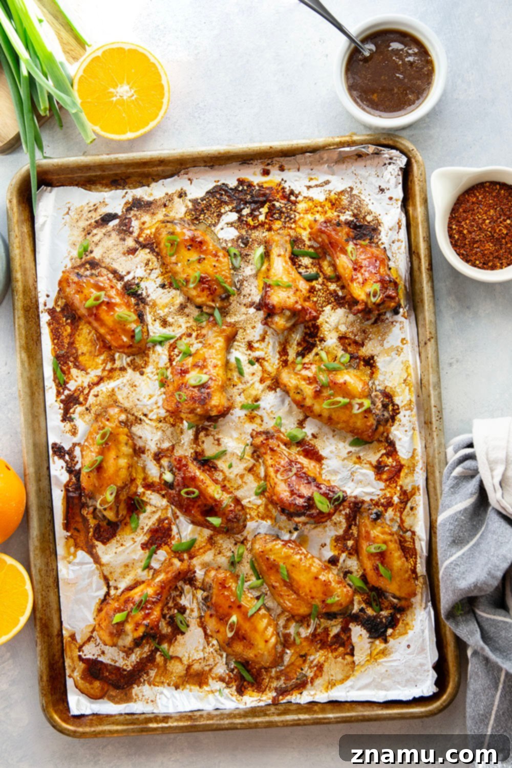 Sweet Heat Orange Wings 3 Oven baked to crispy perfection and tossed in a sweet and spicy orange hot honey sauce, these hot honey chicken wings are the ultimate game day appetizer!